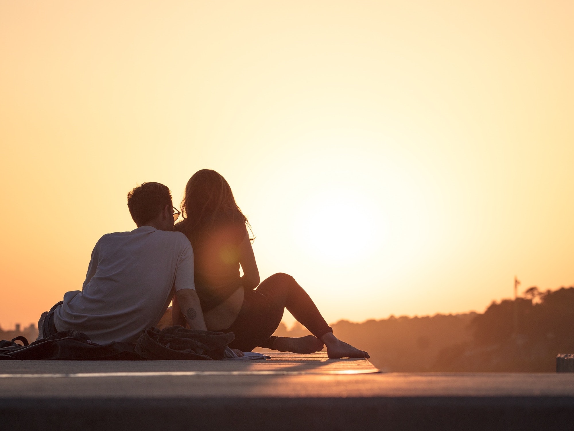 Couple sitting next to each other